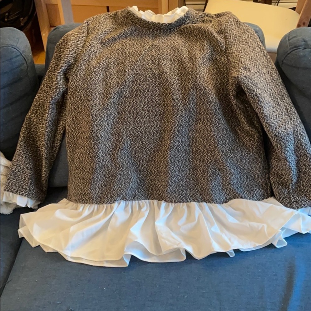 Long sleeved blouse with white ruffle detail